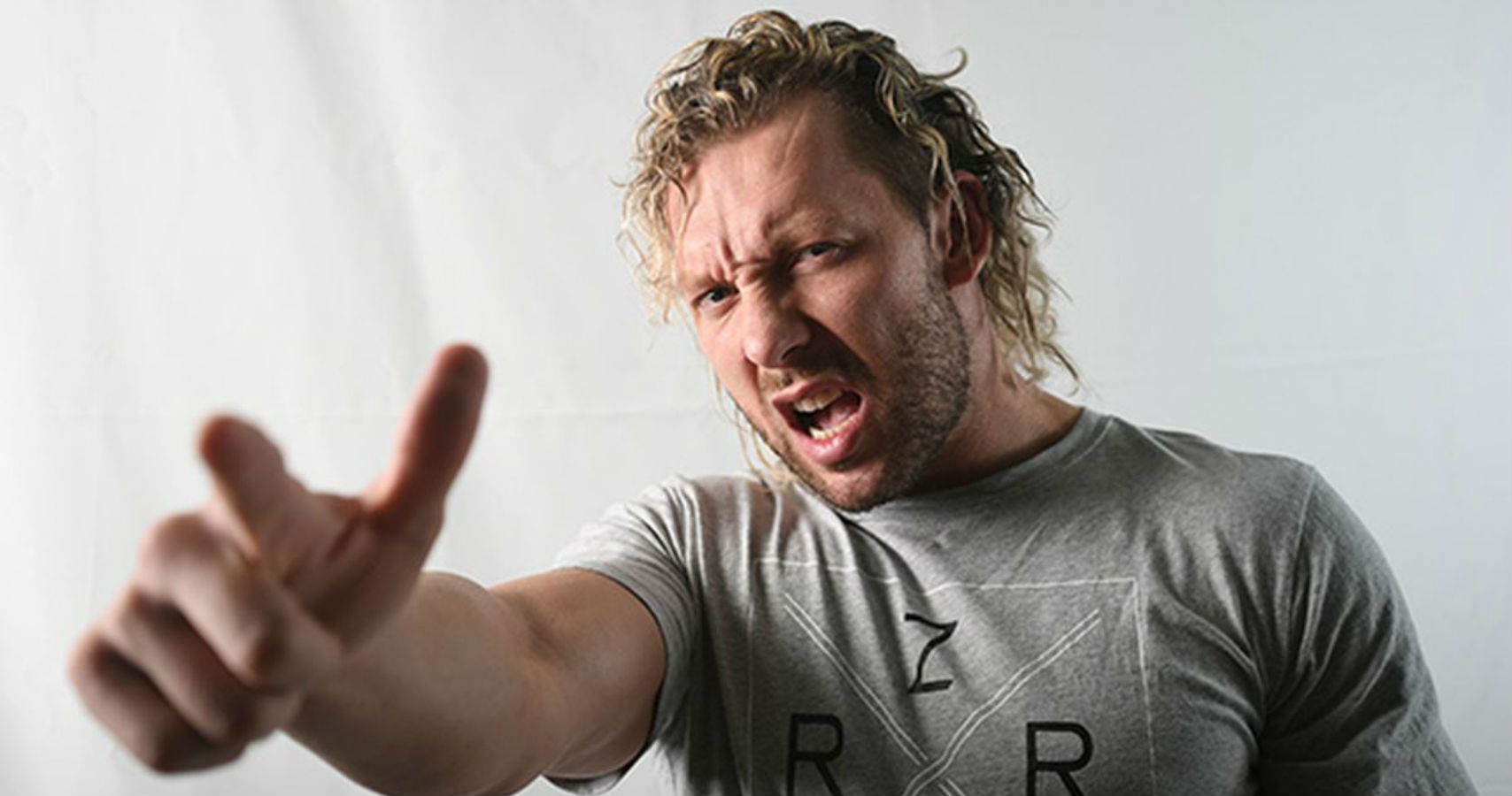 kenny omega wrestles doll